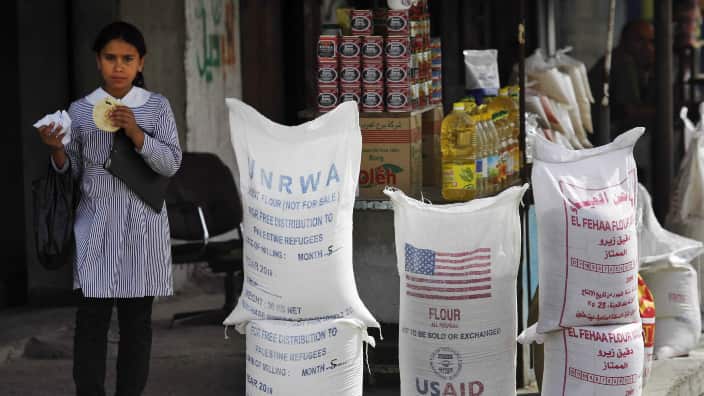n this June 6, 2010 file photo, sacks of flour, some part of humanitarian aid by UNRWA and USAID, but now offered for sale by a vendor