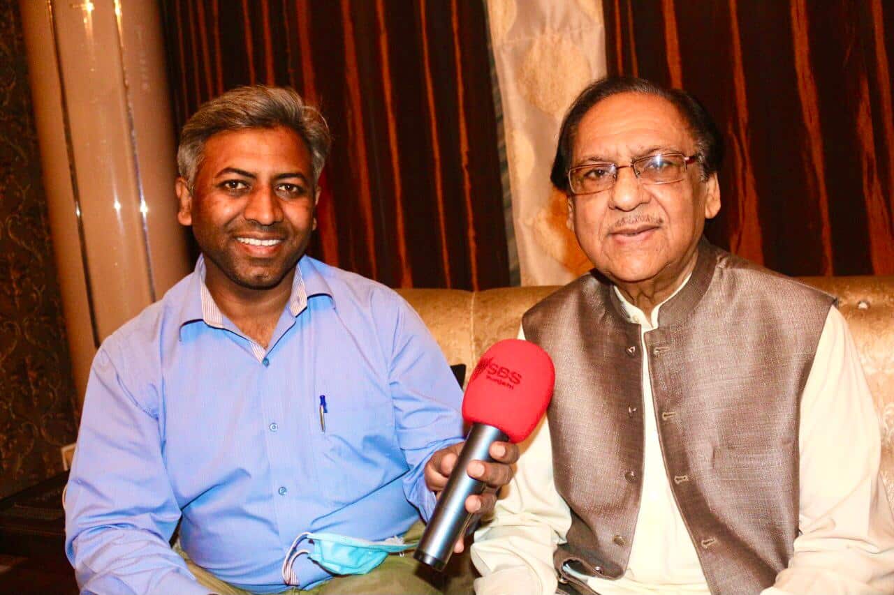 Ghulam Ali (R) speaking to SBS Punjabi coorrespondent Masood Mallhi.