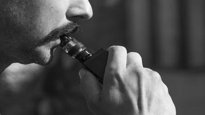 Man with e-cigarette