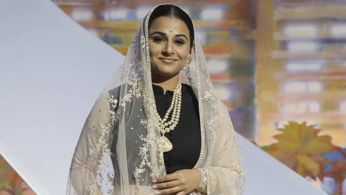 Actress and jury member Vidya Balan acknowledges applause during the opening ceremony ahead of the screening of The Great Gatsby at the 66th international film festival, in Cannes, southern France, Wednesday, May 15, 2013. (AP Photo/Francois Mori)