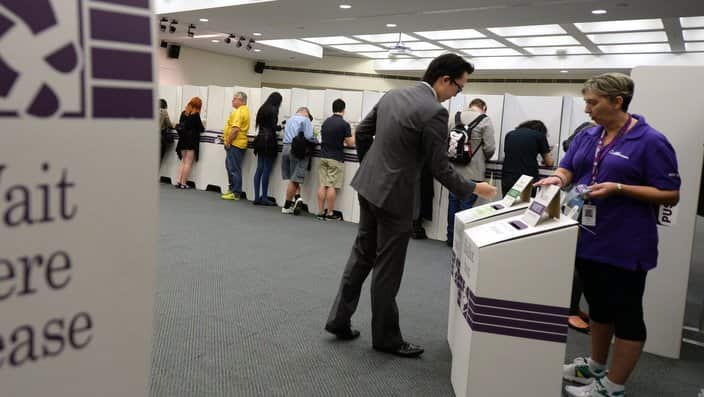 Representational picture of people cast their vote at a voting centre in Brisbane