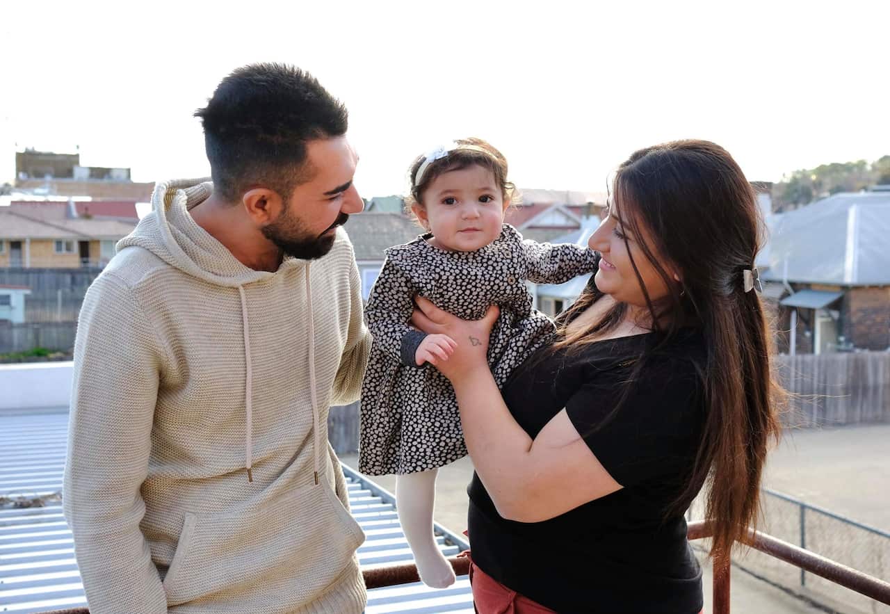 Waleed Khalid Alali with his family