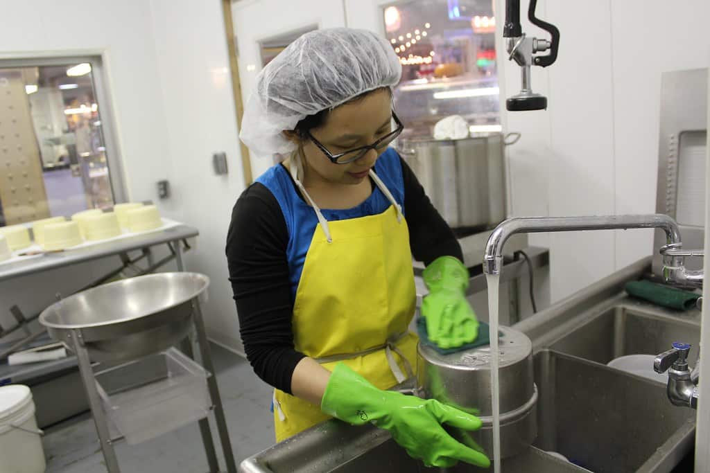 Washing dishes in restaurants and hospitals.