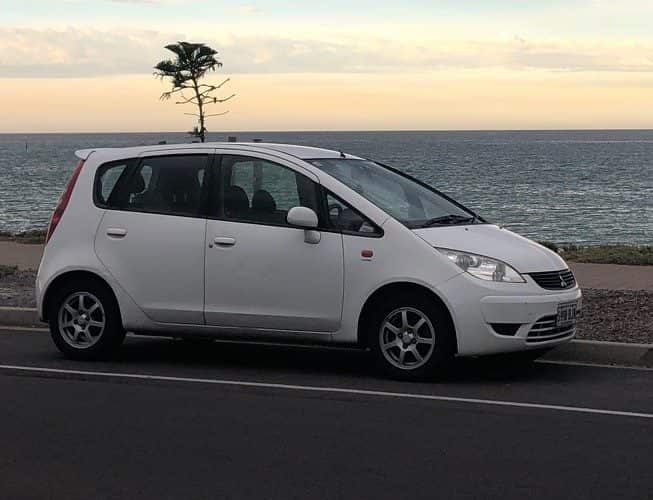 Nishal Ghimire’s white Mitsubishi Colt 