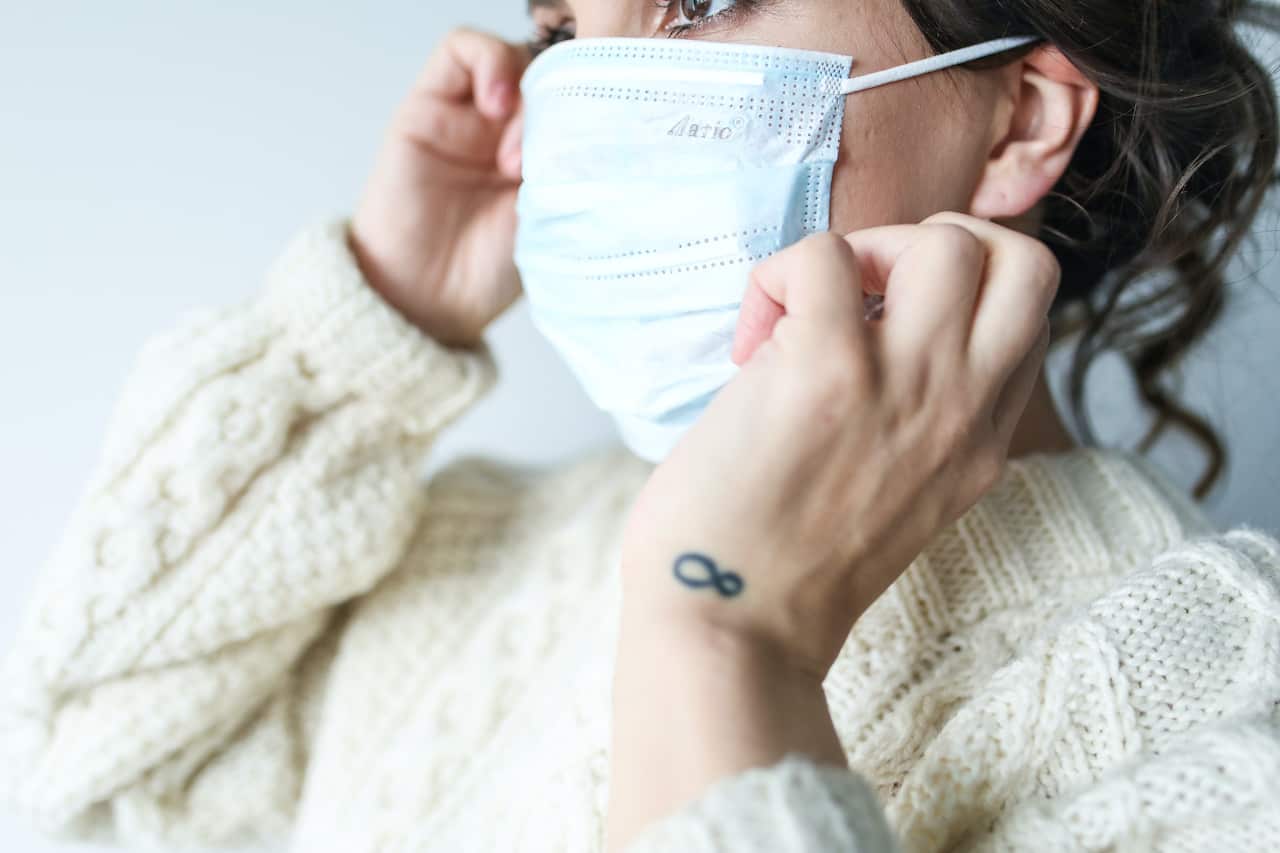 The Australian government recommends wearing face masks when leaving home