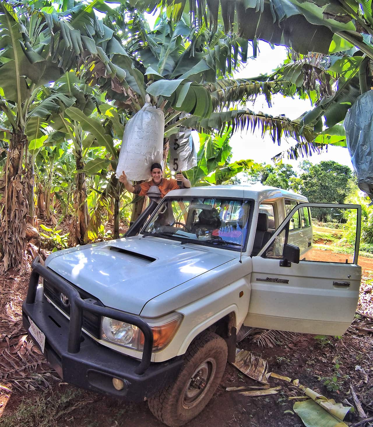 Alessandro driving his 4wd in a banana farm