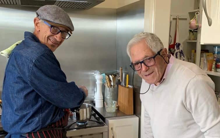 Aldo Reggiani with his son in the kitchen
