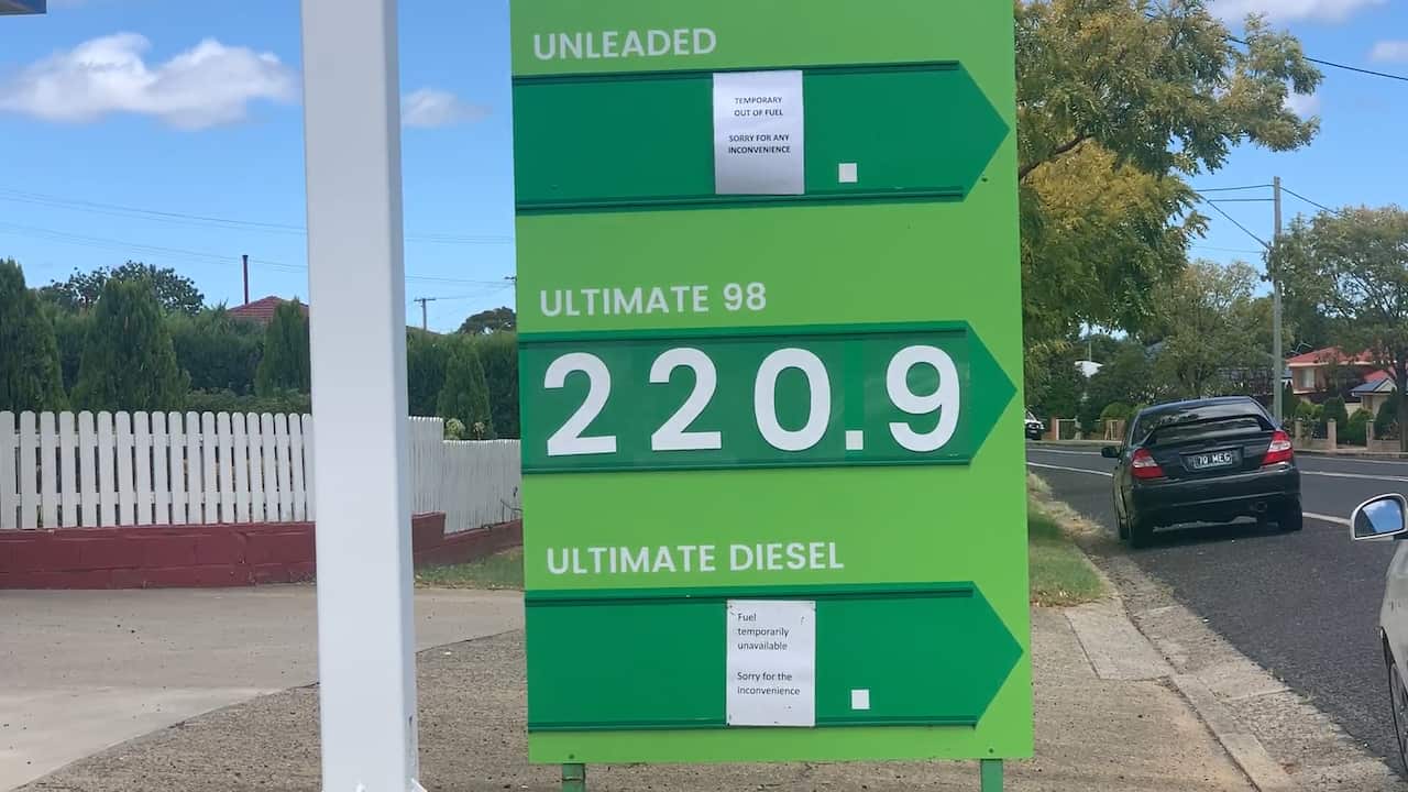 A petrol station with a sign that says there is no fuel available.