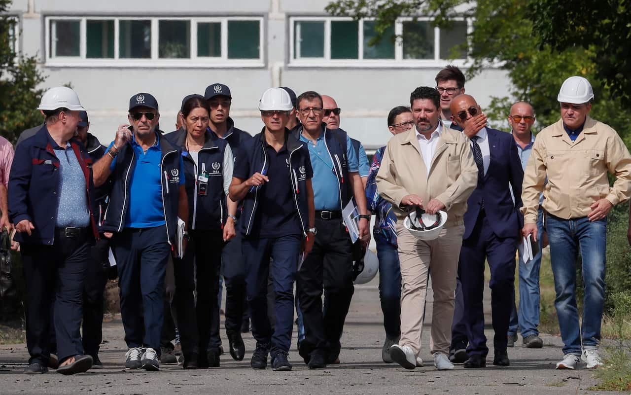International Atomic Energy Agency Director-General Rafael Mariano Grossi (centre) and International Atomic Energy Agency members inspect the Zaporizhzhia Nuclear Power Plant. 